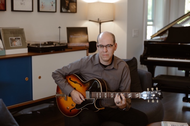 Marc Schonbrun holding his Gibson ES-175 archtop